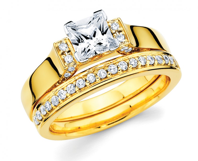 14k cathedral engagement ring and wedding band